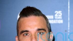 Robbie Williams and Ed Godrich to auction off artworks