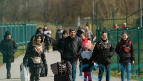 Some refugees returned to Ukraine due to visa delays , claims Holyrood minister