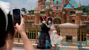 Hong Kong Disneyland reopens as Covid cases ease but deaths rise in Shanghai