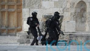 Israeli police storm Jerusalem holy site after rock-throwing
