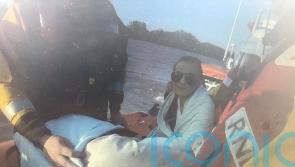 Lifeboat crews rescue 16 people and three animals after boats run aground