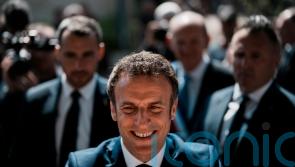 Emmanuel Macron beats Marine Le Pen to win second term, polls suggest