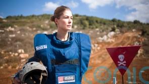 Actress Rosamund Pike backs campaign to clear unexploded bombs in Laos