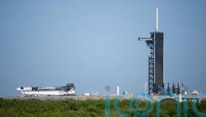 Trio back on Earth after charter trip to space station