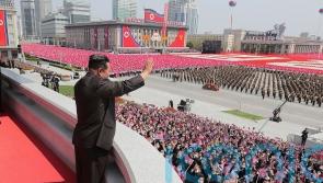 Kim Jong Un vows to bolster nuke capability during parade