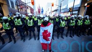 Canadian police in face-off with protesters opposed to coronavirus mandates