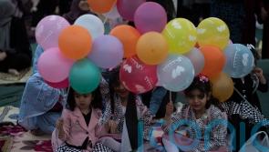 Muslims mark Eid al-Fitr holiday