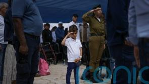 Hecklers interrupt Israel Prime Minister’s Memorial Day speech on unity