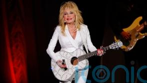 Dolly Parton, Eminem and Lionel Richie inducted into Rock & Roll Hall of Fame
