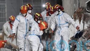 Survivor found almost six days after China building collapse