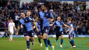 Wycombe claim 2-0 win over 10-man MK Dons in first leg of play-off semi-final