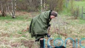 Princess Royal plants tree on visit to planned wildlife discovery centre