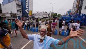Troops deployed to Sri Lankan capital amid clashes during protests over crisis