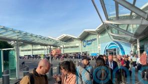 Airline passengers forced to wait outside airport for hours