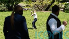 Sadiq Khan practises pitching baseball in Central Park ahead of MLB appearance