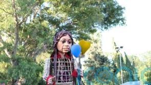 Giant puppet visits Ukrainian refugees in Poland