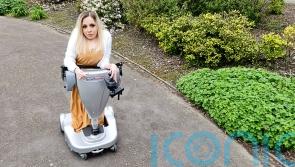 Woman unable to sit for 30 years as her hips and joints have fused is terrified her legs will “fail at any moment” making standing impossible