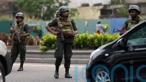 Sri Lanka extends curfew after violence and prime minister’s resignation