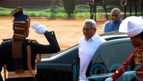 Sri Lankan president vows to shed powers and appoint prime minister