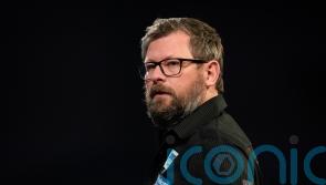 World number five James Wade back in the UK after health scare in Germany