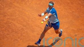 Rafael Nadal returns to winning ways on clay with Rome victory over John Isner