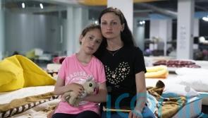 Mother who fled Ukraine hopes she can get treatment for daughter in Germany