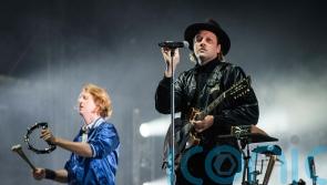 Arcade Fire celebrate chart success with sixth album We