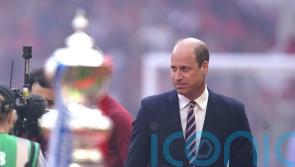 William hands FA Cup to Liverpool after victory against Chelsea