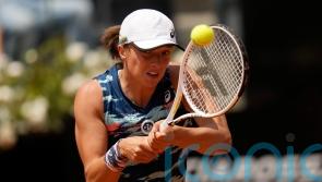 Iga Swiatek continues winning run to lift Italian Open crown