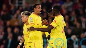 Liverpool take title race to the final day with comeback victory at Southampton