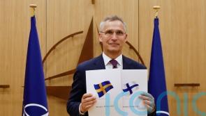 Nato chief hails ‘historic moment’ as Finland and Sweden apply to join alliance