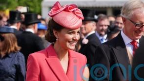 Kate delights at sunsoaked Buckingham Palace garden party
