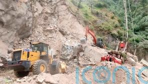 Body found as search continues for workers trapped by tunnel collapse in Kashmir