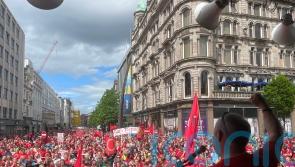 Thousands of protesters march through Belfast calling for Irish language rights