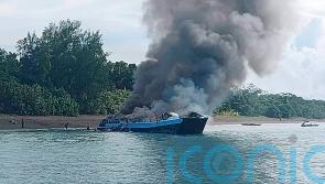 Seven dead and more than 120 rescued from water after ferry fire in Philippines
