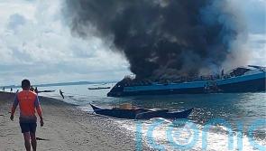 Seven dead and more than 120 rescued from water after ferry fire in Philippines