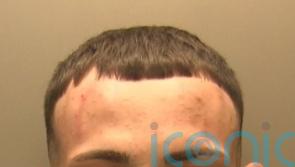 Jail for drug dealer who hid smuggled phone ‘up his backside’ during cell raid