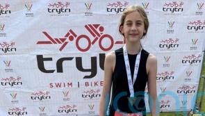 Ten-year-old takes on triathlon in memory of stillborn brother