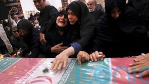 Thousands attend funeral for Revolutionary Guard colonel shot dead in Iran