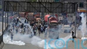 Police in Pakistan fire tear gas in bid to stop ex-PM Khan’s banned rally