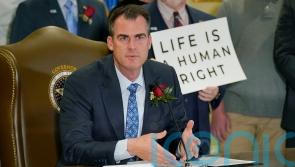 Oklahoma governor signs strictest abortion ban in the US