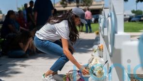 Meghan lays roses at memorial for victims of Texas school shooting