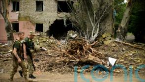Russian troops storm city amid eastern Ukraine bombardments