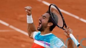 Marin Cilic and Casper Ruud battle through to reach French Open semi-finals