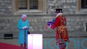 Delighted Queen leads first day of Jubilee at beacon lighting and on balcony