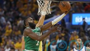 Boston Celtics ride late surge to 120-108 victory over the Golden State Warriors