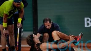 Rafael Nadal reaches French Open final after Alexander Zverev injured in fall