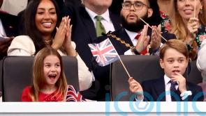 Sing-song for royals as George and Charlotte join flag-waving Windsors