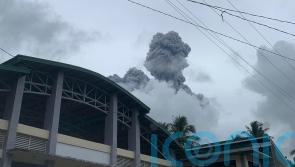 Philippines volcano spews ash and steam