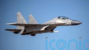 Australia says Chinese fighter jet threatened plane over South China Sea